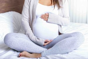 what happens to abdominal muscles during pregnancy
